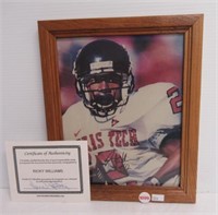 Framed 8 x 10 autographed Ricky Williams college