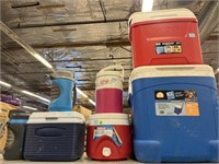 Assorted coolers and insulated jugs. Igloo,