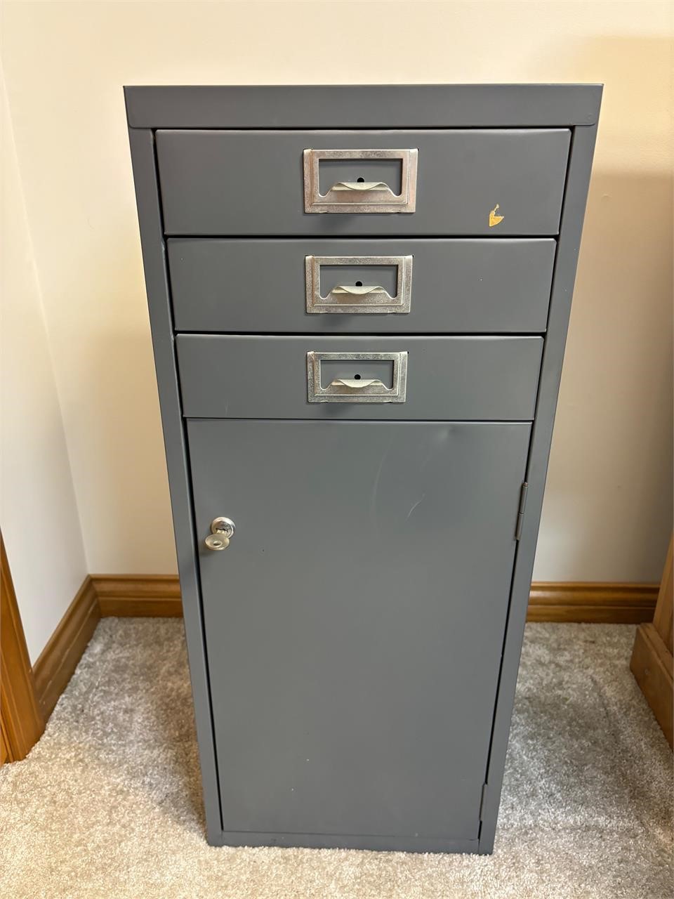 Small gray metal cabinet w/ sewing supplies