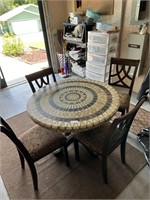 Kitchenette round table with four dining chairs