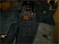 Over 25 pairs of assorted blue jean pants,