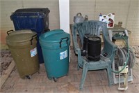 3 trash cans full of wood, 2 plastic chairs, woode