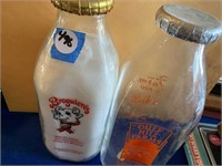 PAIR OF VINTAGE GLASS MILK BOTTLES