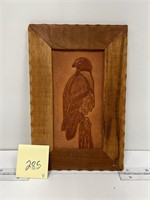 Bird tooled on leather in frame
