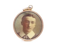 Antique gilt metal portrait pendant