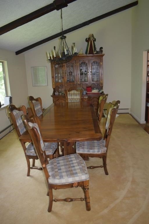Pine DR table 108x42x29"h, 6 chairs and china clos