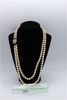 Faux pearls.