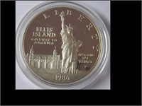 1986 ELLIS ISLAND SILVER DOLLAR