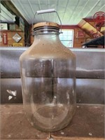 Large glass jug with lid