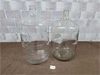 2 Carboy glass jugs. Good for making wine or water