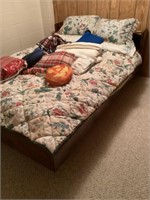 Full size bed with bedding