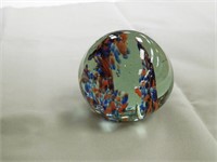 Glass paperweight, orange and blue
