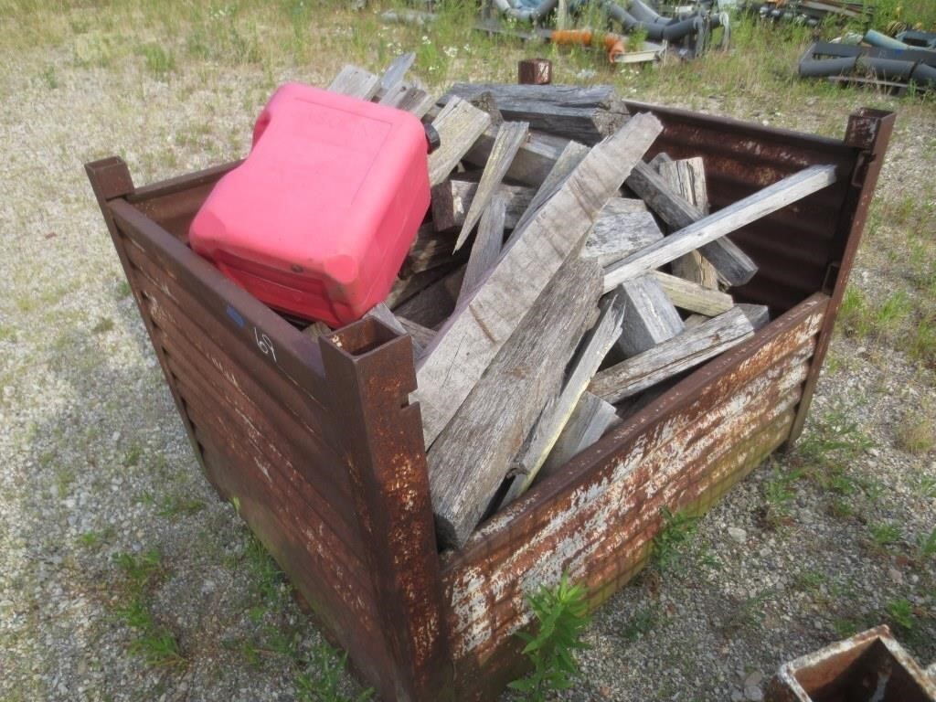 Metal basket with misc. wood