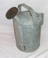 Vintage galvanized watering can.