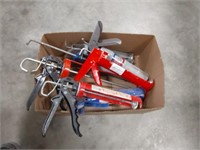 assortment of caulk guns