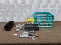 Wrenches and sockets with basket