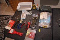 Tools, cable ties, mouse trap, scraper