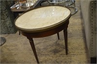 Low marble top boulette table