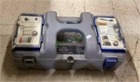 Electric Dremel with multiple accessories in a