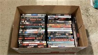 Box of DVDs includes titles such as A River