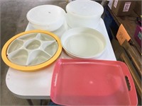 Plastic trays and 2 Tupperware storage containers