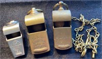 2-BRASS MILITARY AND 1 STAINLESS  WHISTLES