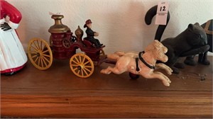 Antique cast-iron fire pump, horse drawn, wagon