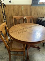 42 inch in diameter clawfoot dining table with