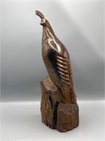 Carved wood quail sculpture