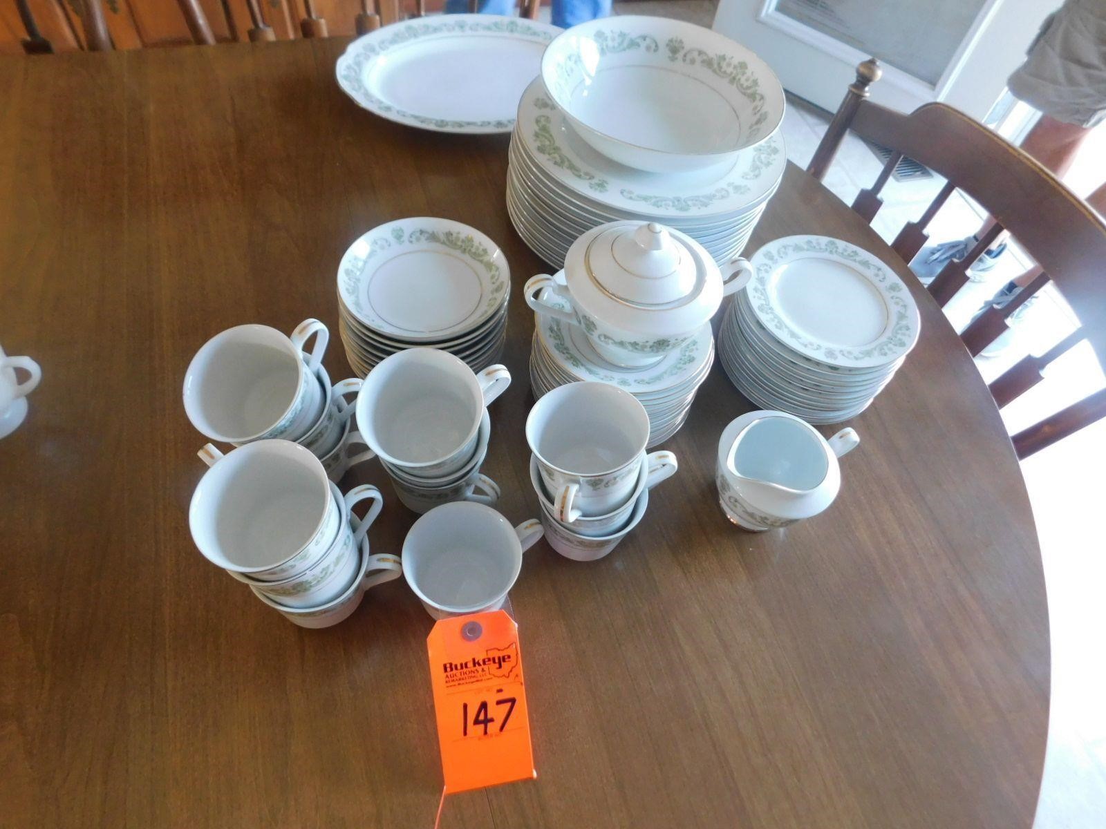 Lot 147  Style House China setting for (12).