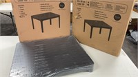 (2) new in box side tables. Both are shrink