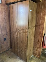 Storage cabinet with water damage on the base