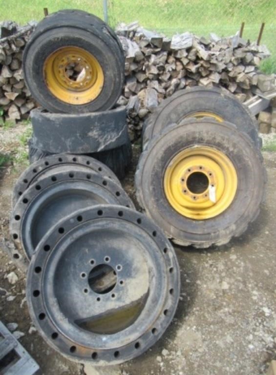 (9) Assorted skid steer tires on rims sizes
