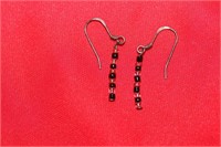 A Pair of Sterling Earrings