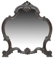 BAROQUE REVIVAL EBONIZED CARVED FRAME MIRROR