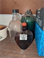 Glass jugs and heart bottle