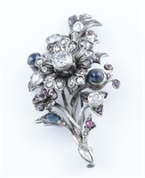 3.5ctw Diamond, sapphire and ruby floral brooch.