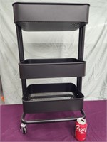 3 tier cart on casters. 30.5" H.  Look at the