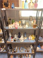 Shelf and all the Avon cologne bottles