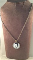 Elvis Presley pendant on a 20 inch chain