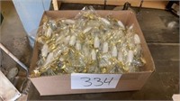 Box of new gold and white cabinet handles