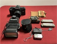 Vintage camera with accessories, 2 harmonicas,