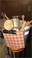 Bucket of wood and metal utensils