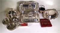 Three silver plated lidded serving dishes