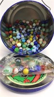 Tin of marbles. Some shooters included.