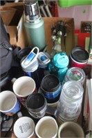 Water bottles and coffee mugs