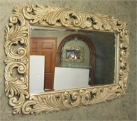 Ornate Framed Beveled Wall Mirror. Measures 31"x