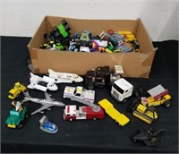 Box of toy cars some are kids meals and some are
