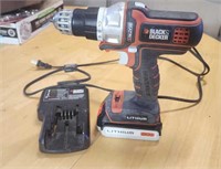B&D  cordless drill & charger works.