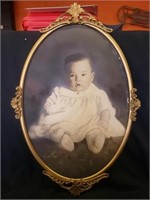 Metal framed baby picture